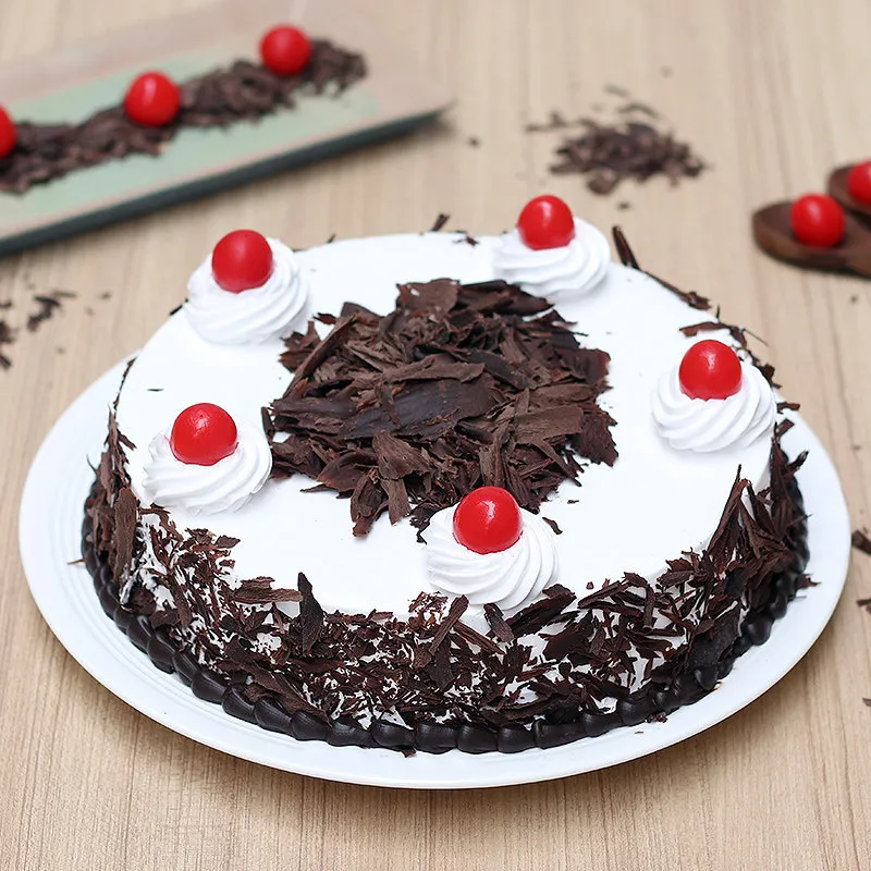 Eggless Black Forest Cake Recipe - Swasthi's Recipes